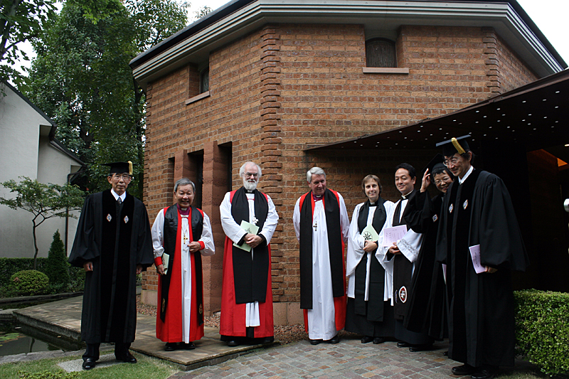 The Archbishop of Canterbury, the Bishop of Tokyo Peter Jintaro Ueda of Tokyo, Bishop Timothy Stevens of Leicester, and members of staff from the school