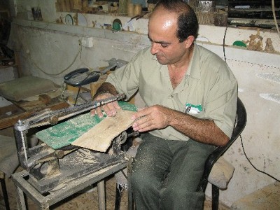 An olive wood supplier in his workshop - an FHL project