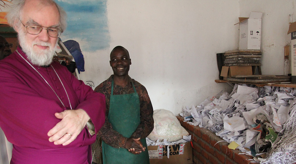 Archbishop Rowan in the papermaking workshop at the Nchima Trust Centre