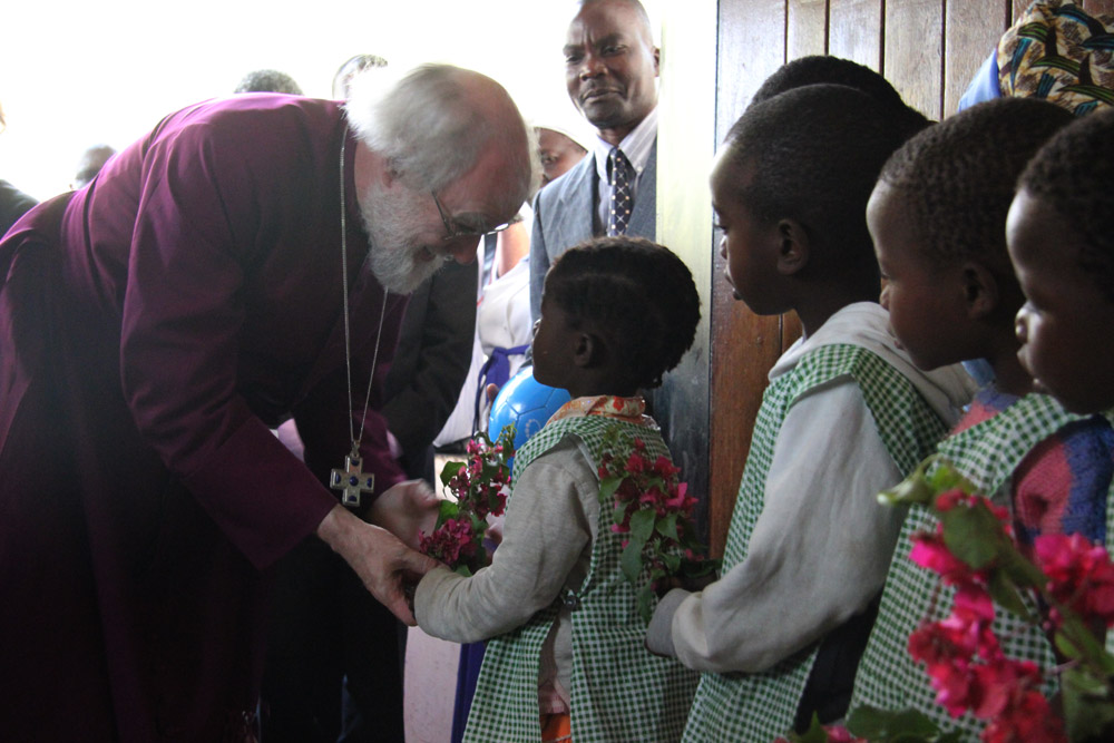 Archbishop with nursery school children at All Saints parish