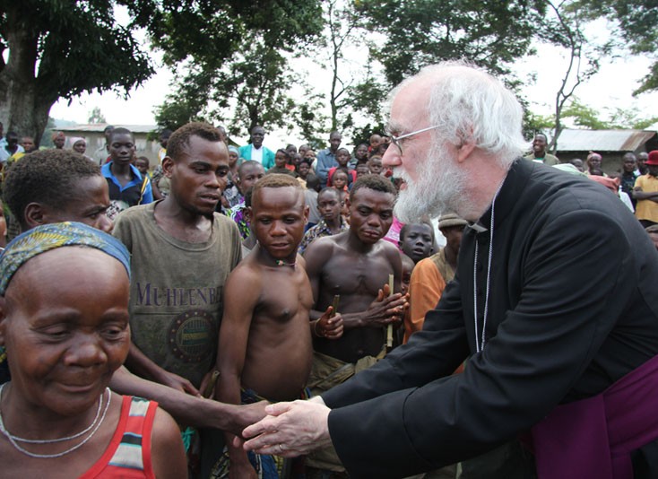 Archbishop Rowan with indigenous people in Democratic Republic of Congo, 2011