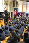 The Archbishop reads poetry at Assembly, Argyle Primary School