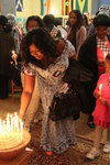 Lighting candles as an act of witness to the need for justice