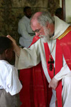 The Archbishop Blessing a Child