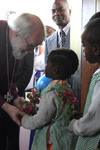 Archbishop Rowan meets nursery children at All Saints Anglican Church